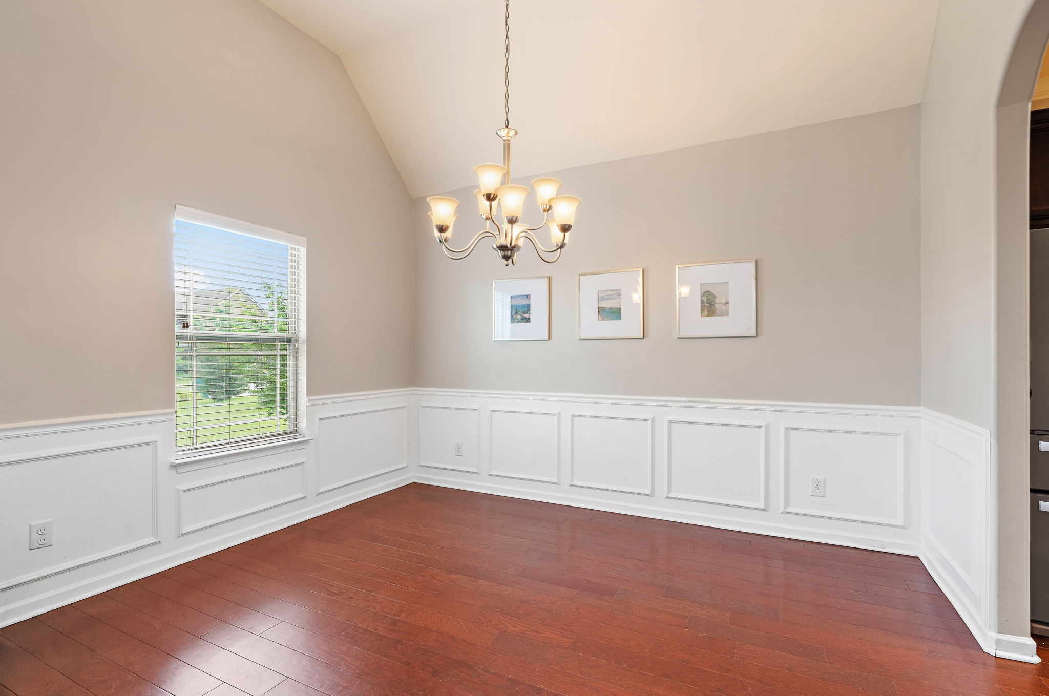 2034 Lincoln Road Spring Hill, TN 37174 - Photo 8 of 51 an empty room with chandelier fan and windows