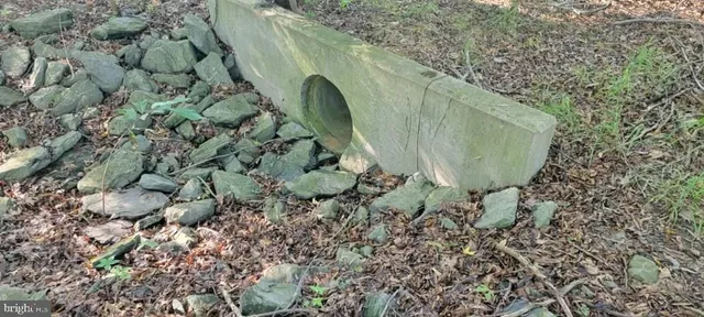 a aerial view of a house with a yard