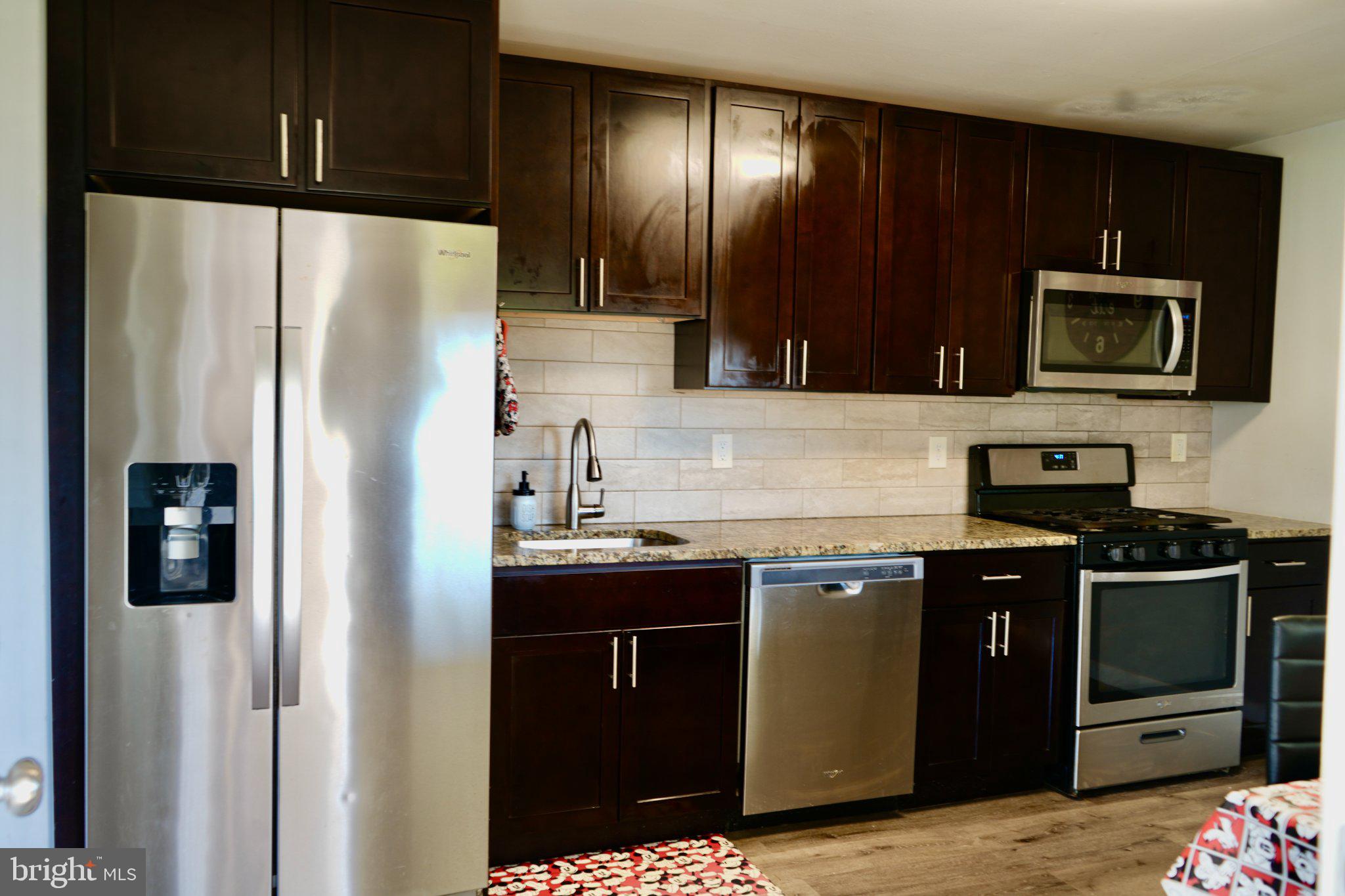 856 Woodlane Road Mount Holly, NJ 08060 - Photo 5 of 24 Modern kitchen with sleek finishes.