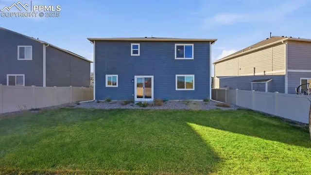 a brick house with a yard