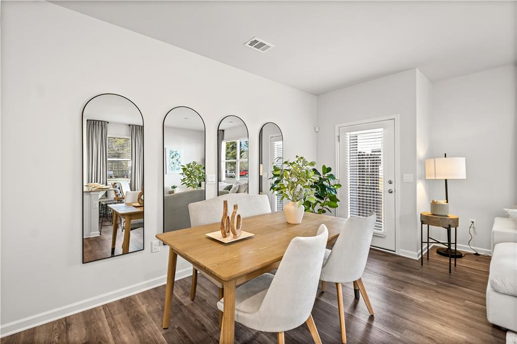 3 Silverbell Lane Northwest Rome, GA 30165 - Photo 10 of 19 a view of a dining room with furniture and wooden floor