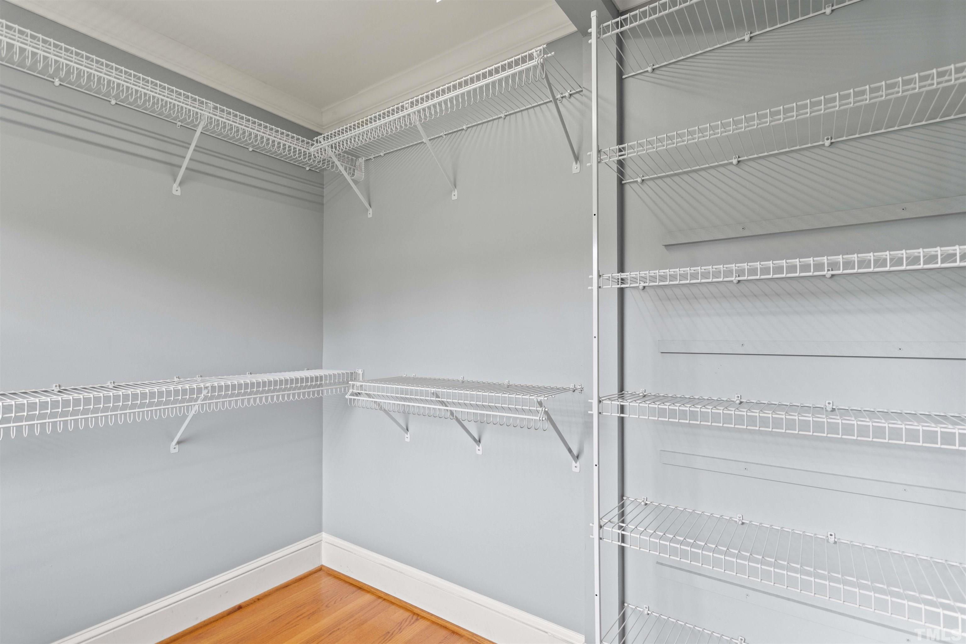 4811 Greenbrier Road Raleigh, NC 27603 - Photo 22 of 41 a view of a room with racks on the wall