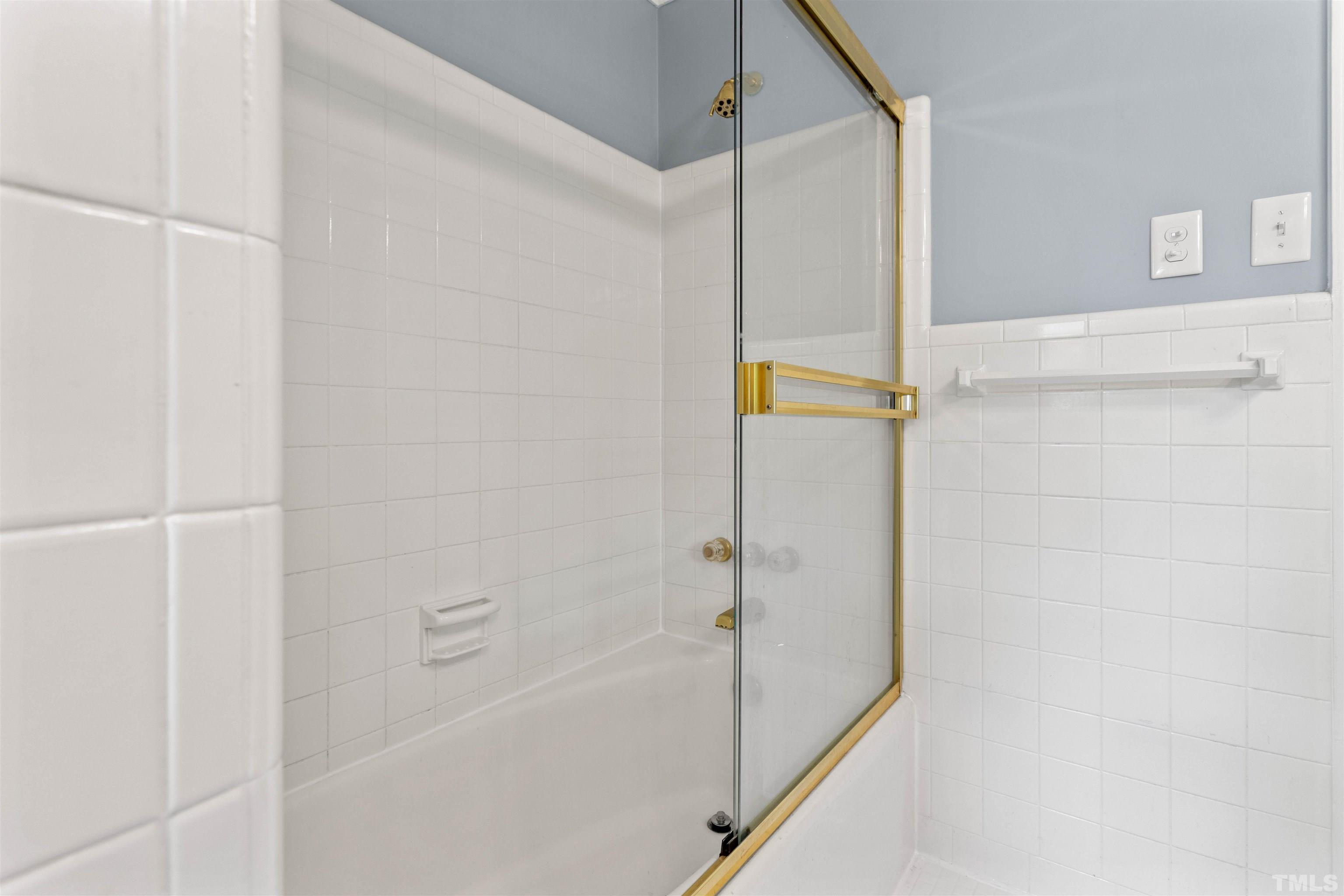 4811 Greenbrier Road Raleigh, NC 27603 - Photo 29 of 41 a bathroom with a bathtub