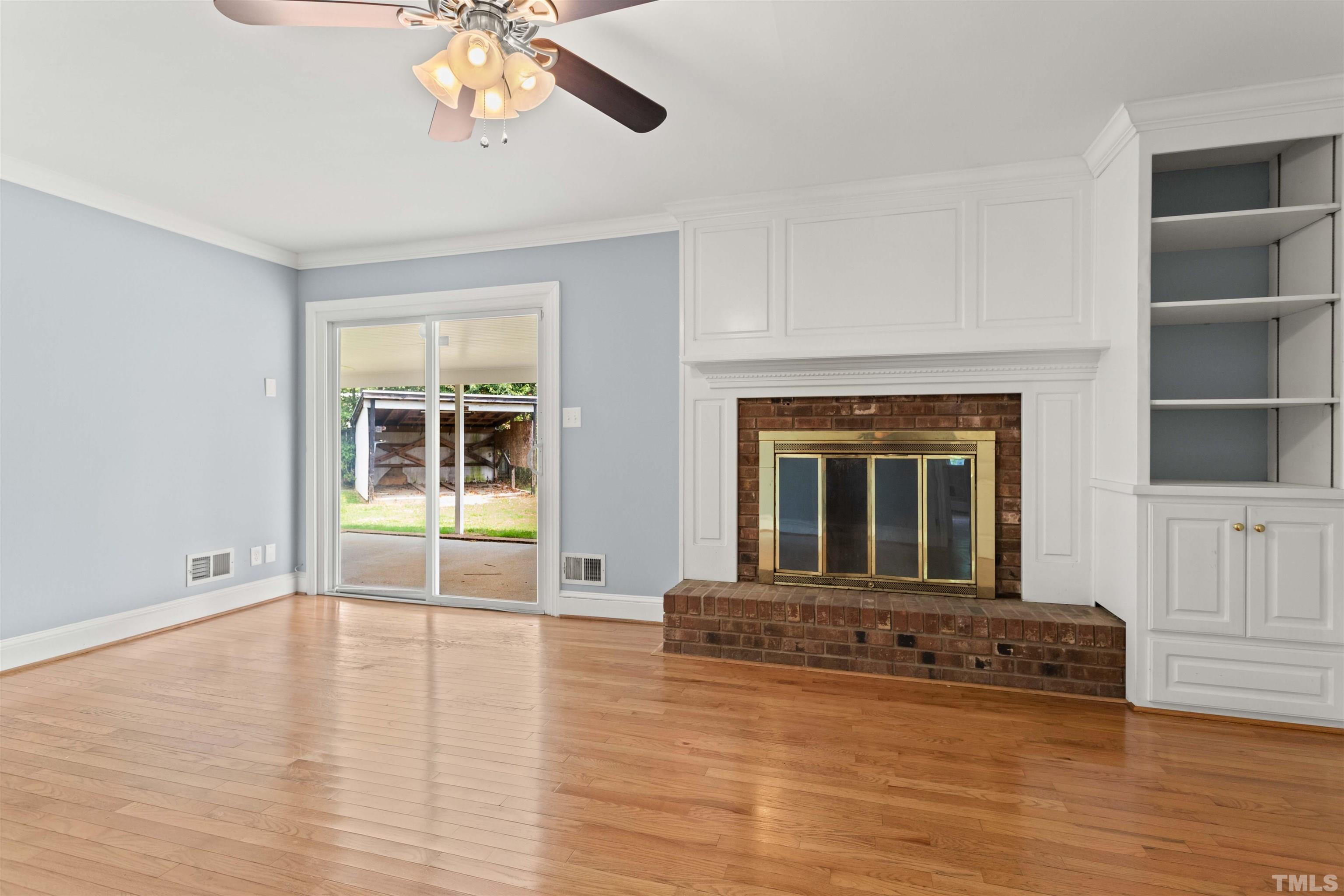 4811 Greenbrier Road Raleigh, NC 27603 - Photo 32 of 41 a view of a room with window and wooden floor