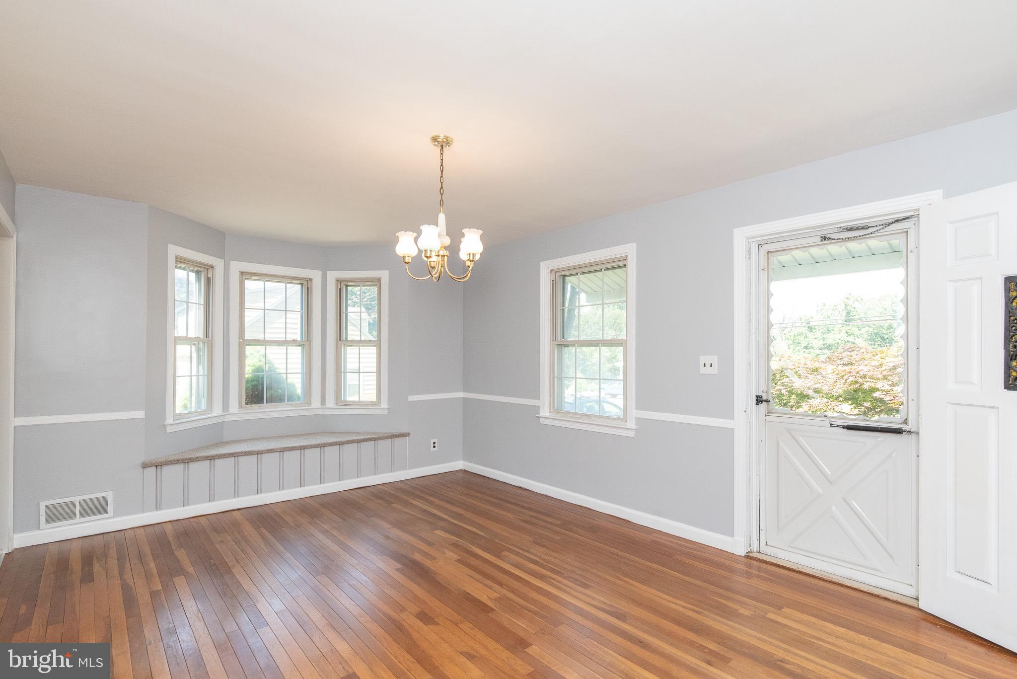 1413 Providence Road Baltimore, MD 21286 - Photo 8 of 33 Dining Room, Orginal Hardwood Floors w/ Bay window