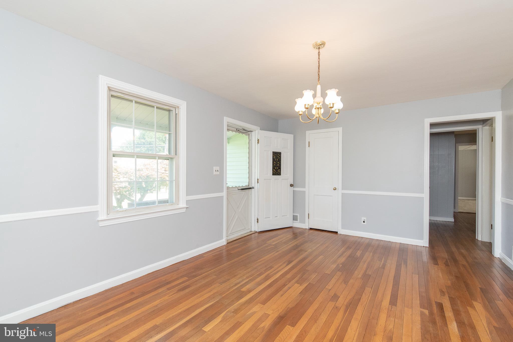 1413 Providence Road Baltimore, MD 21286 - Photo 9 of 33 Dining Room With Front Door at leads to porch
