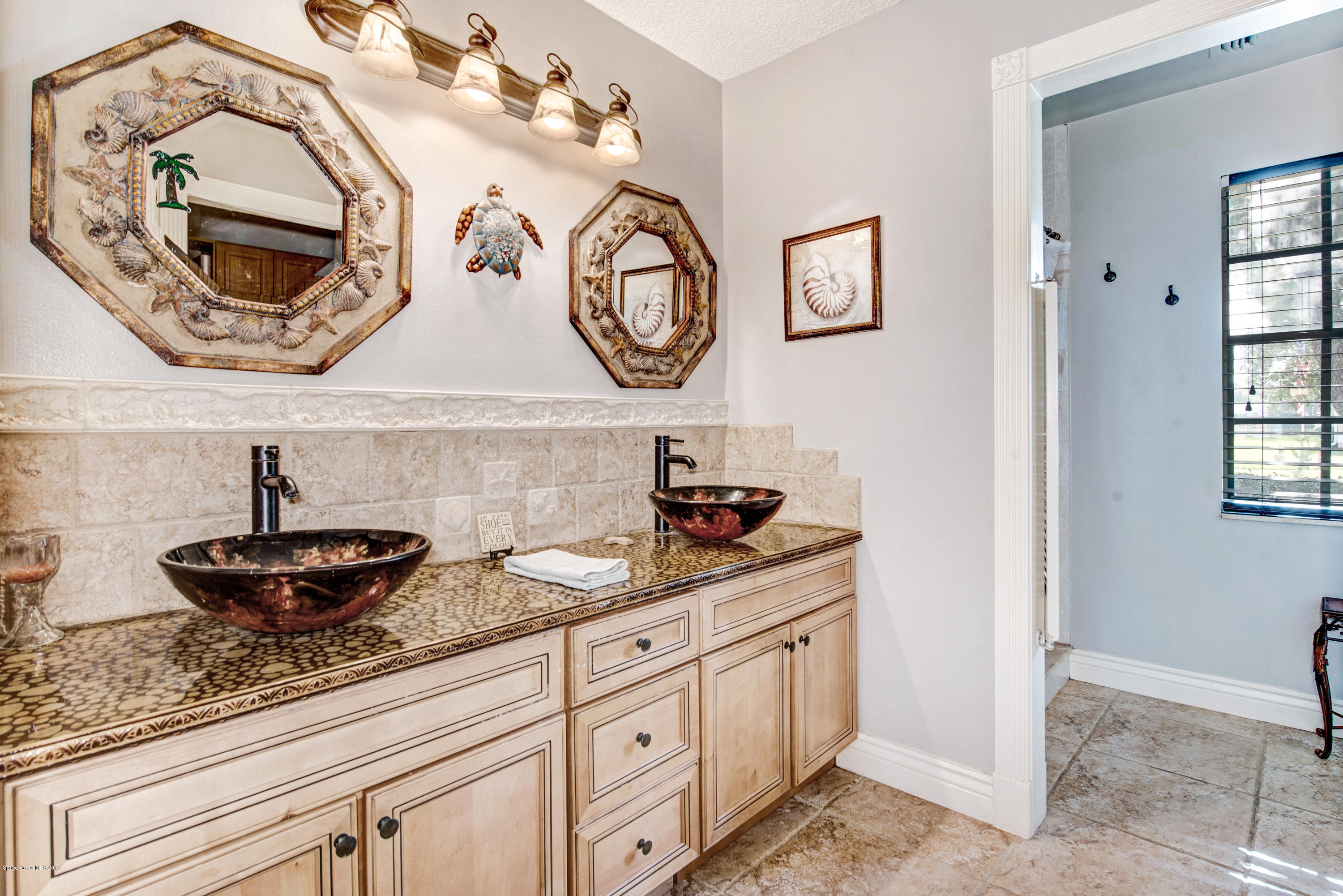 1796 Mallard Lake Road Melbourne, FL 32940 - Photo 21 of 36 Master Bath vanity area