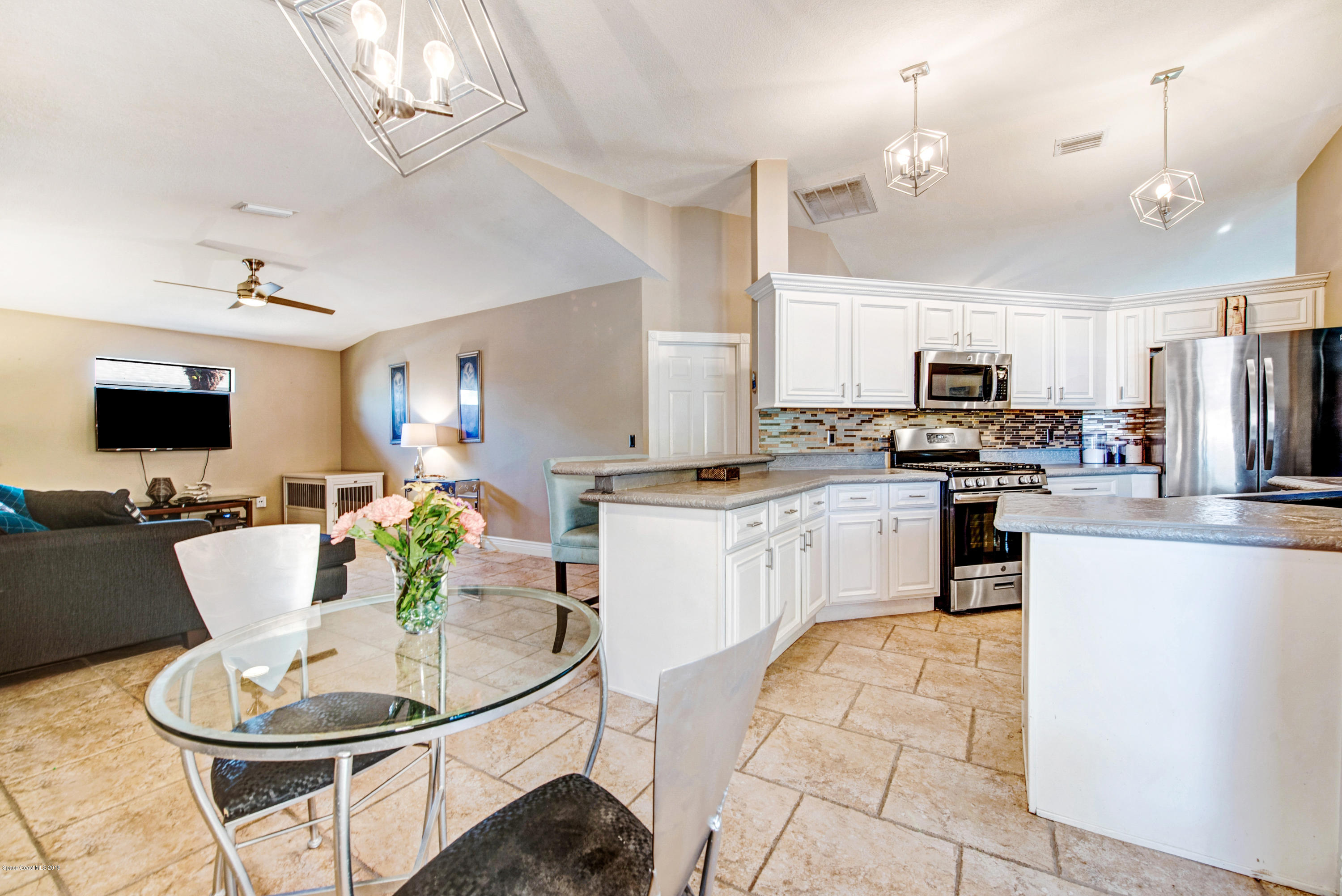 1796 Mallard Lake Road Melbourne, FL 32940 - Photo 9 of 36 Kitchen/Family room