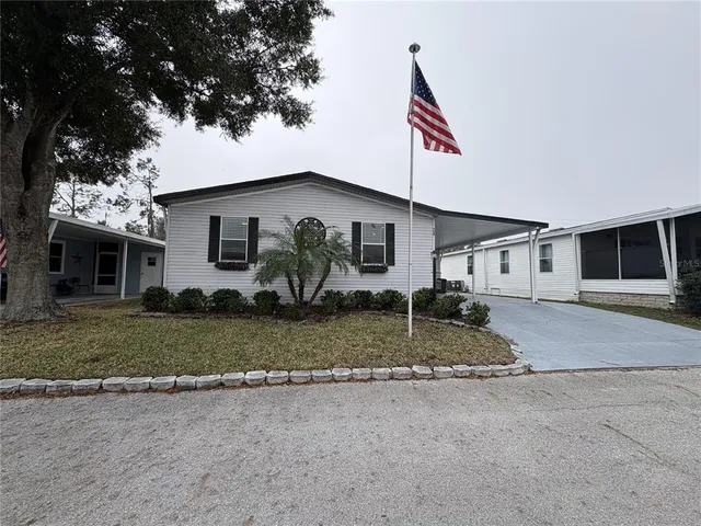 front view of a house with a patio