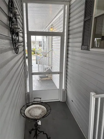 a bathroom with a sink a mirror and a shower