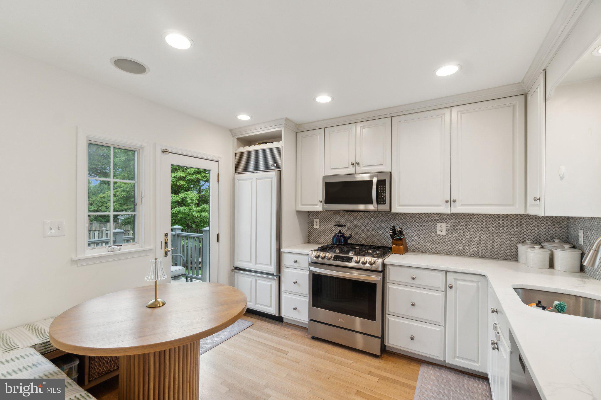 314 Whitestone Road Silver Spring, MD 20901 - Photo 2 of 26 Kitchen opens to the backyard.