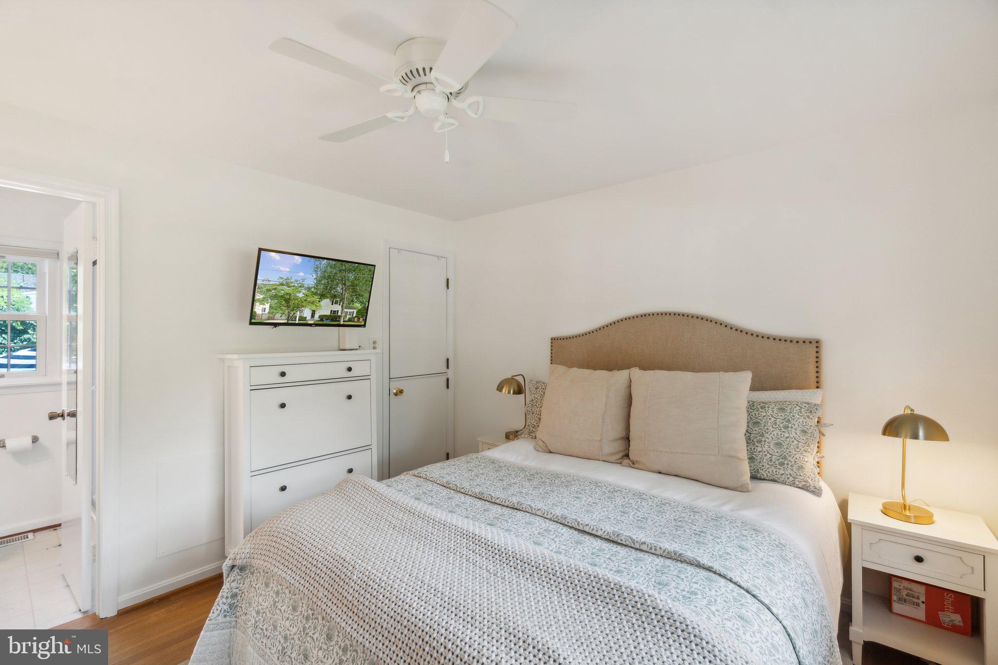 314 Whitestone Road Silver Spring, MD 20901 - Photo 6 of 26 Main level primary bedroom.