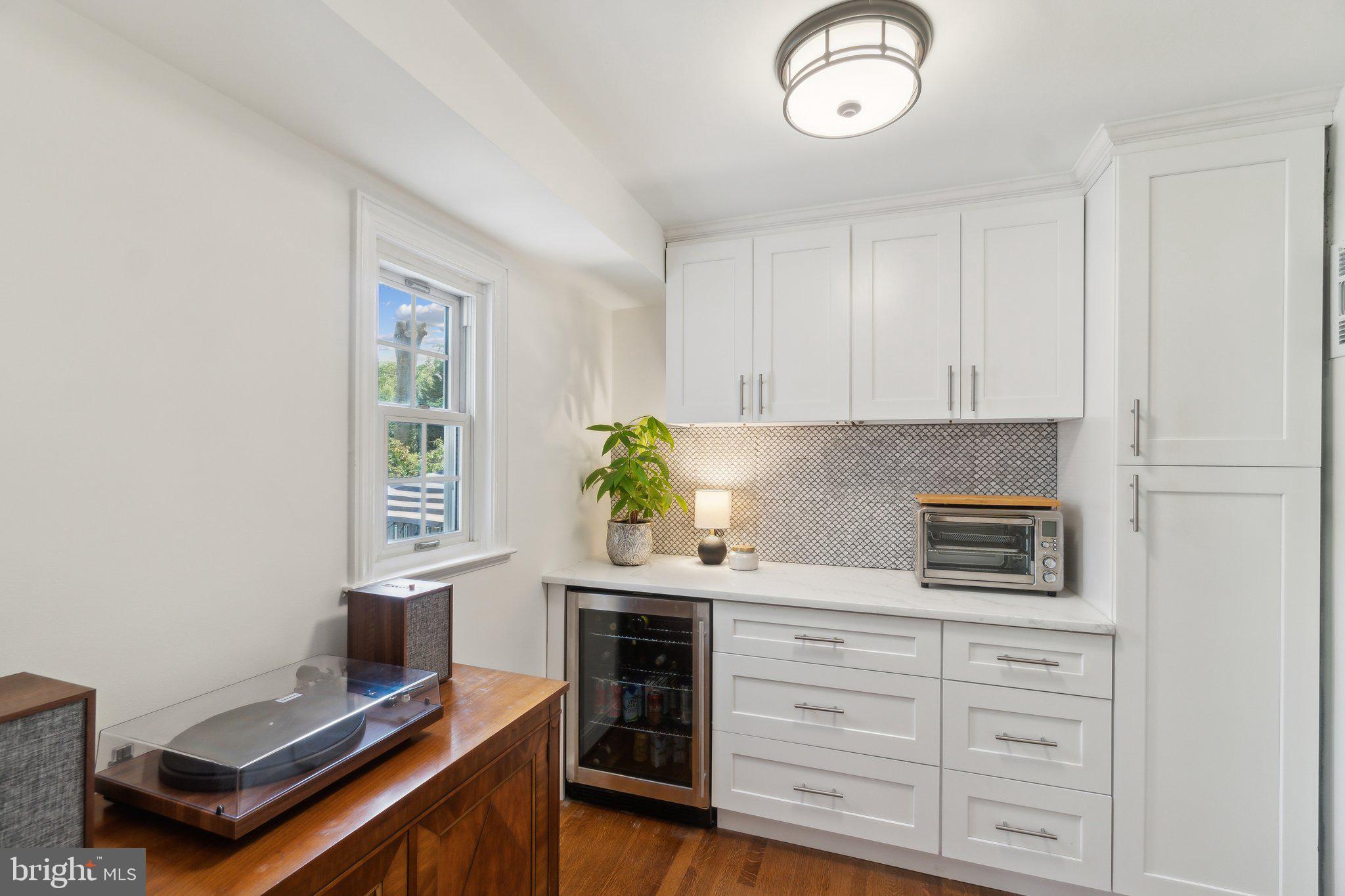 314 Whitestone Road Silver Spring, MD 20901 - Photo 9 of 26 Large butlers pantry with storage.