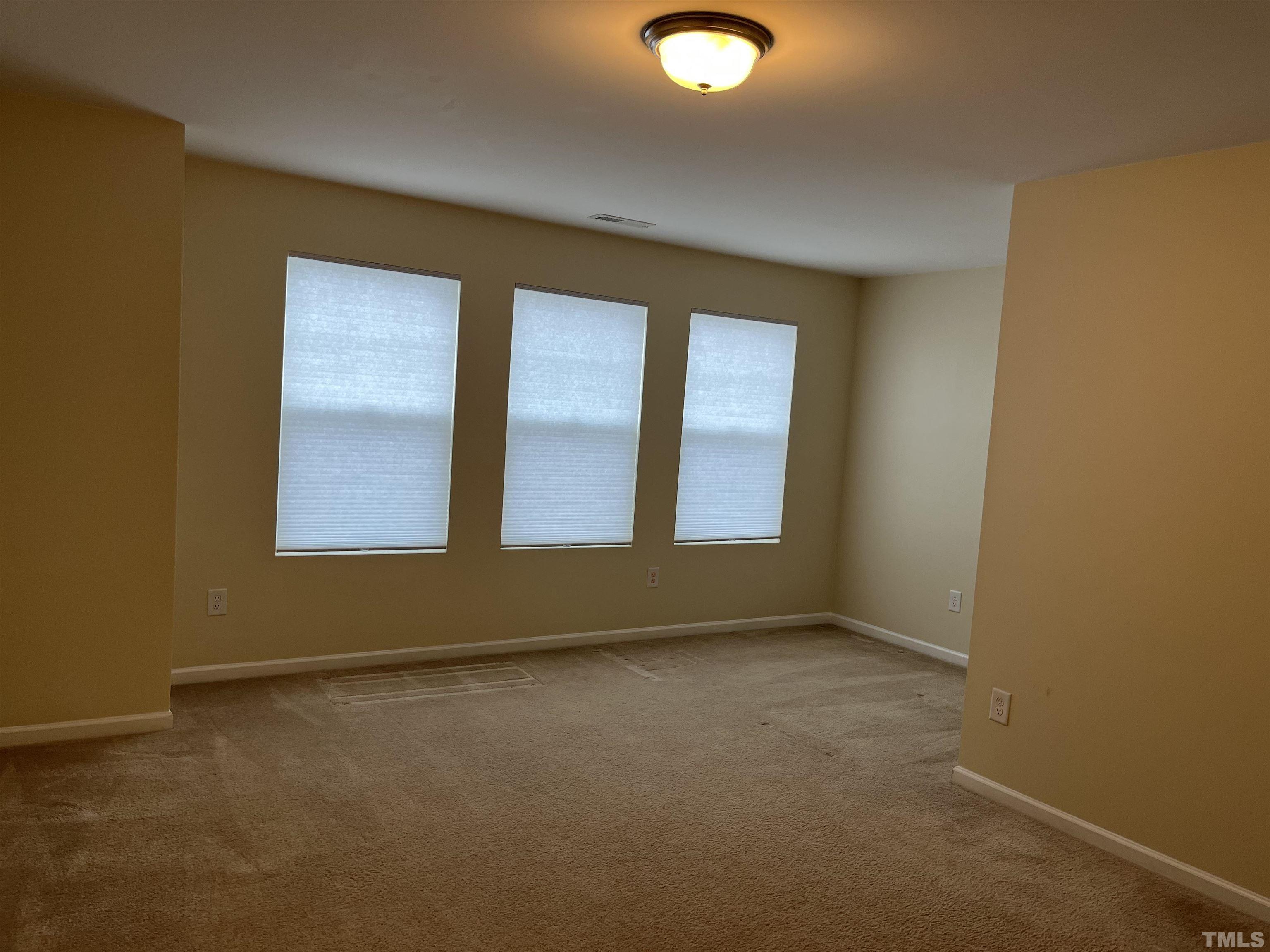 2499 Longshadow Drive Graham, NC 27253 - Photo 11 of 14 an empty room with window
