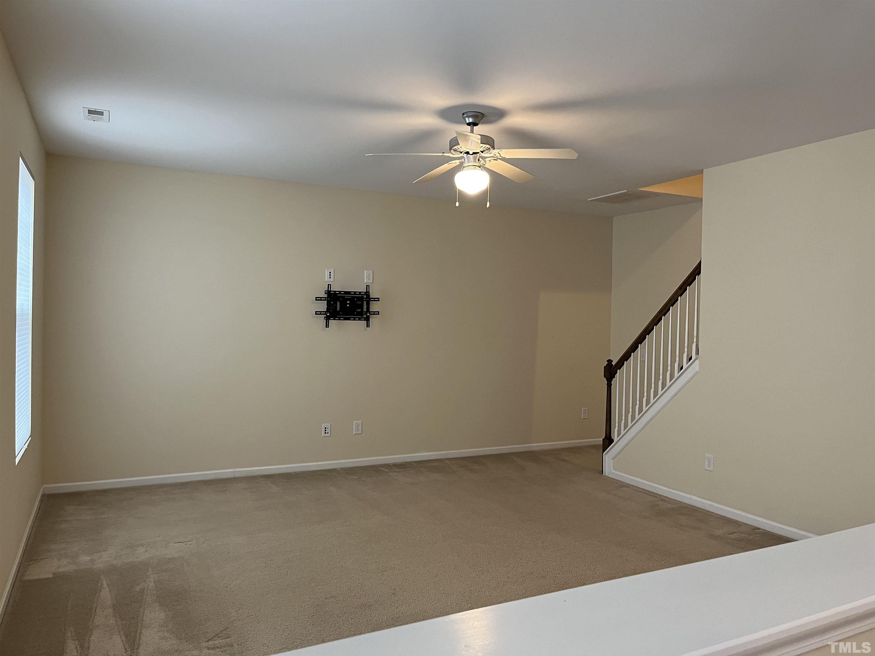 2499 Longshadow Drive Graham, NC 27253 - Photo 6 of 14 a view of an empty room with a window