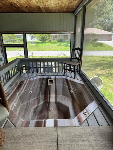 an aerial view of house with yard swimming pool and outdoor seating