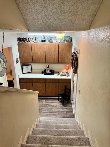 an aerial view of a houses with yard