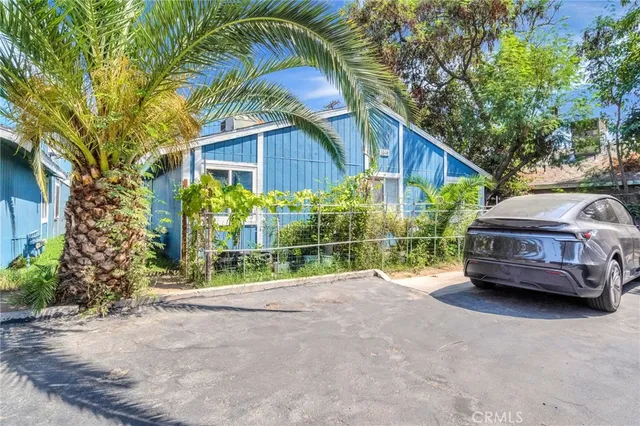 a house view with a garden space