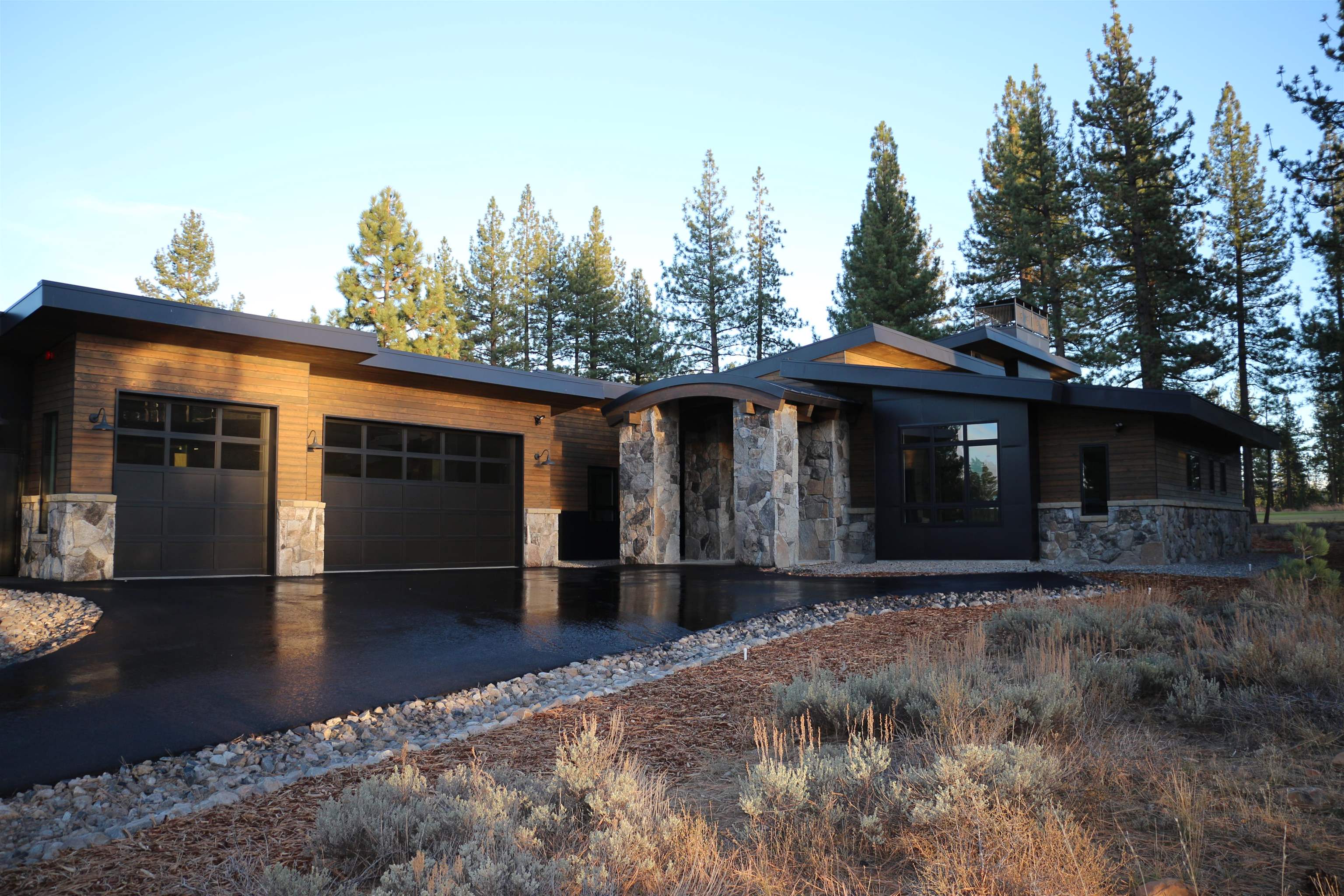11646 Henness Road Truckee, CA 96161 - Photo 1 of 28 a front view of a house with garden
