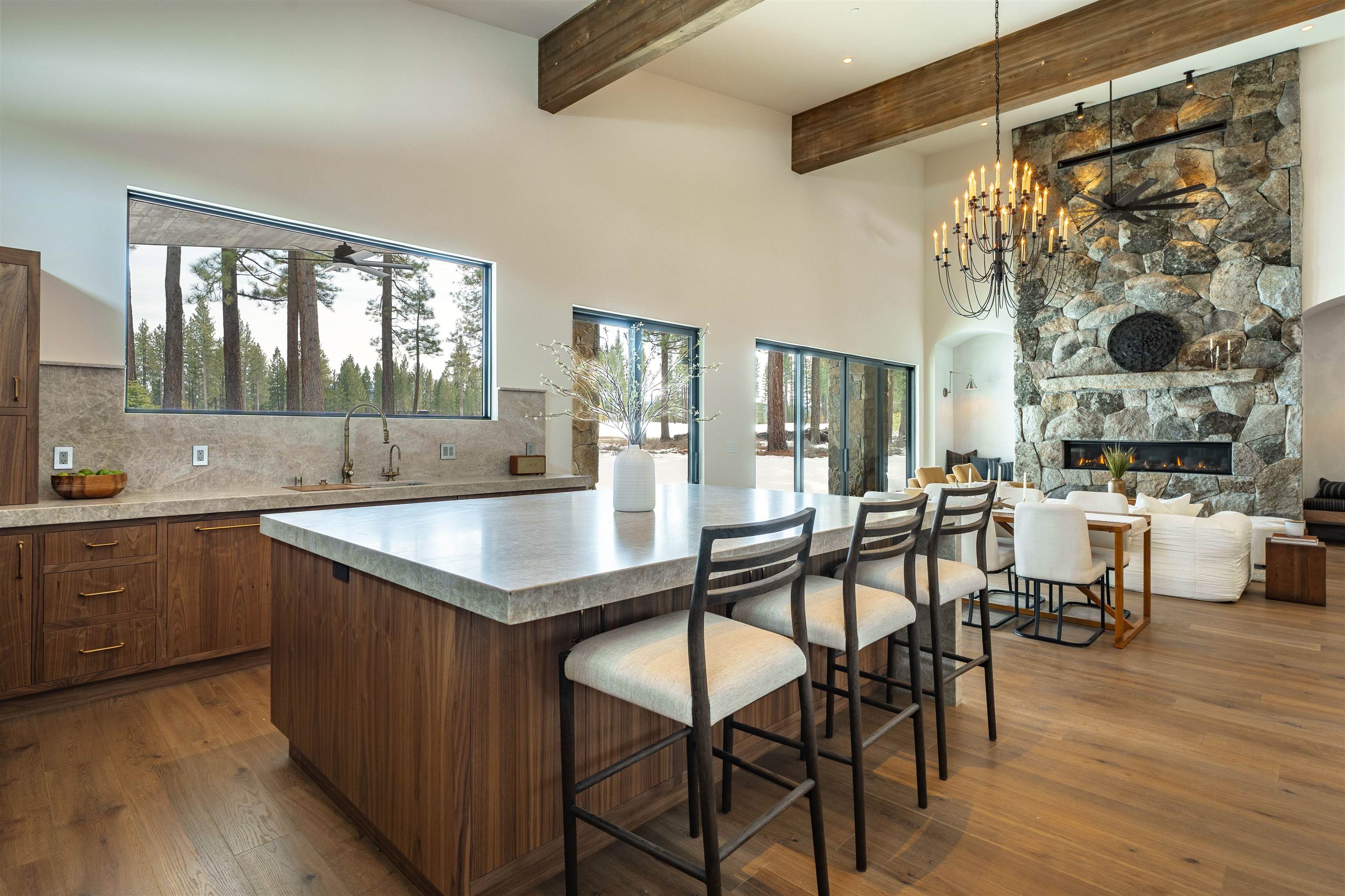 11646 Henness Road Truckee, CA 96161 - Photo 13 of 28 a dining hall with stainless steel appliances granite countertop a stove a sink a dining table and chairs