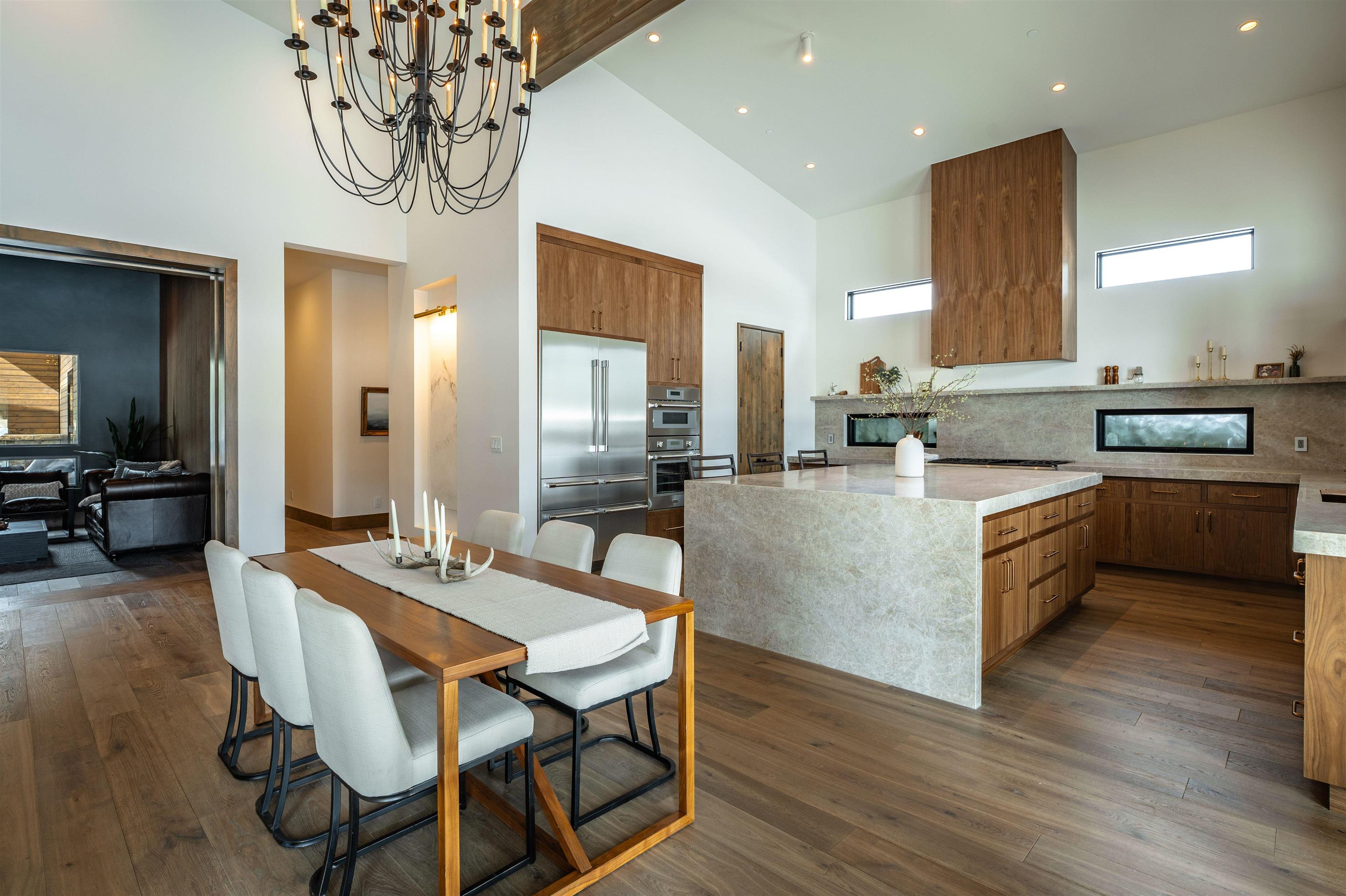 11646 Henness Road Truckee, CA 96161 - Photo 15 of 28 a large kitchen with a table and chairs