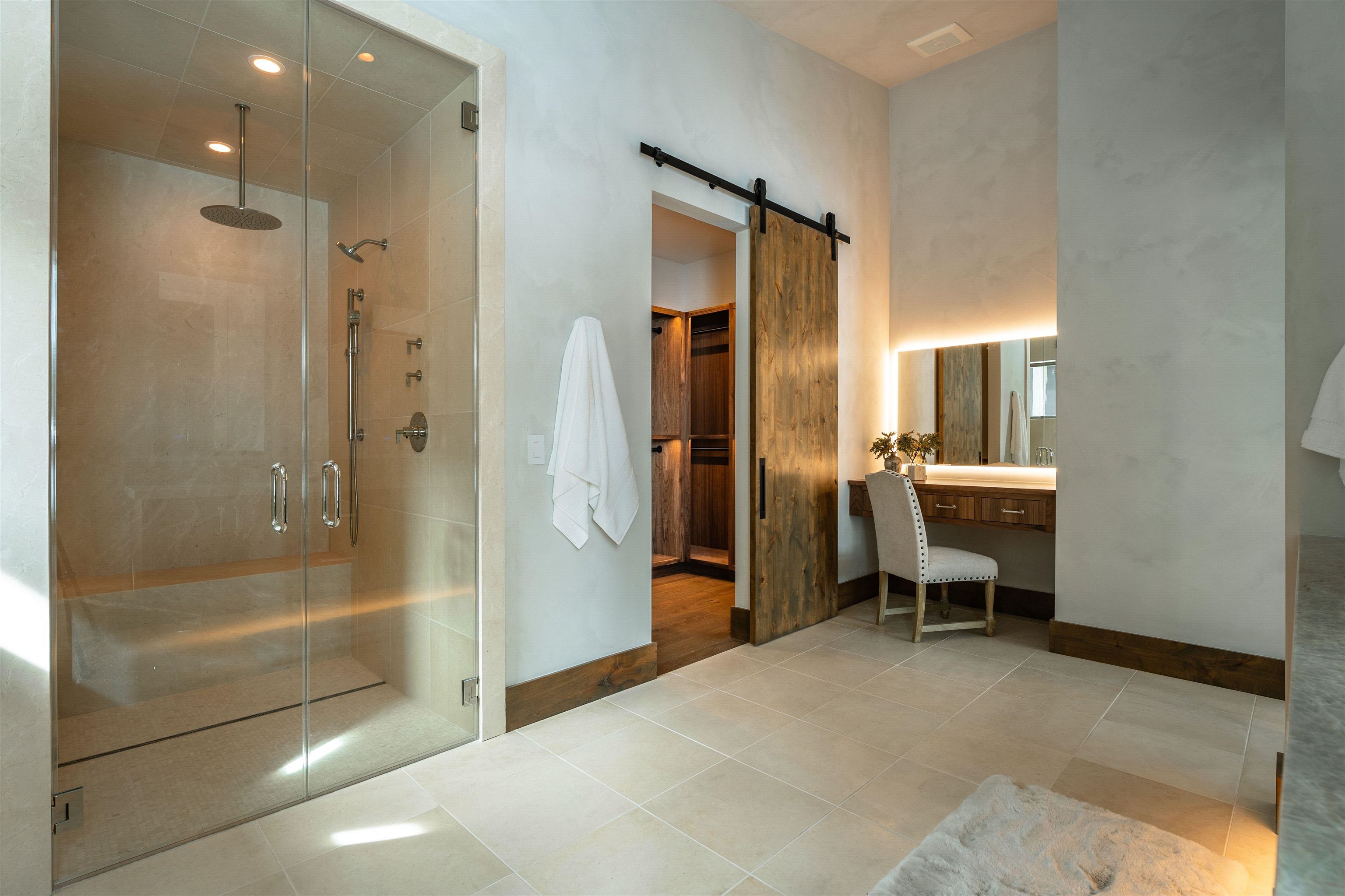 11646 Henness Road Truckee, CA 96161 - Photo 20 of 28 a bathroom with a bathtub and a shower