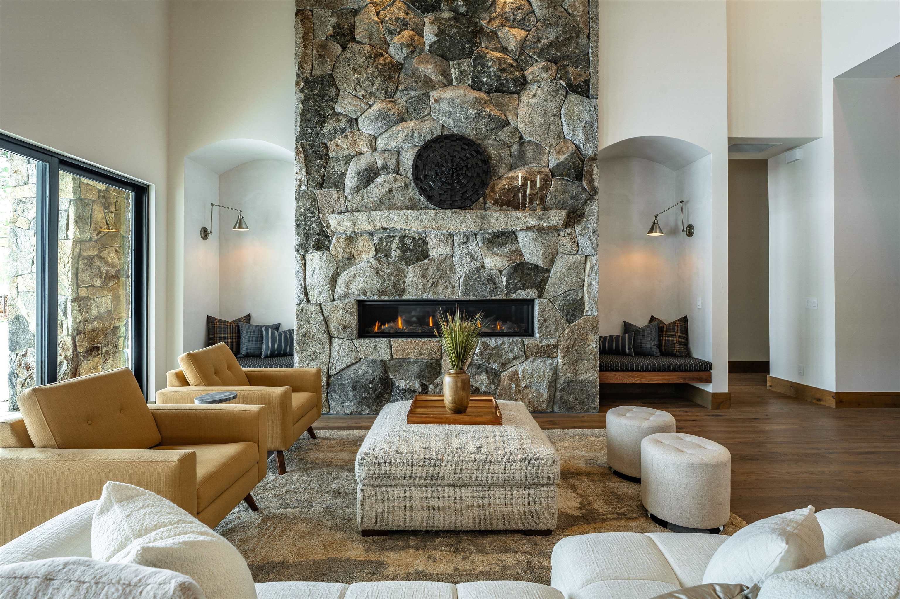 11646 Henness Road Truckee, CA 96161 - Photo 8 of 28 a living room with furniture and a fireplace