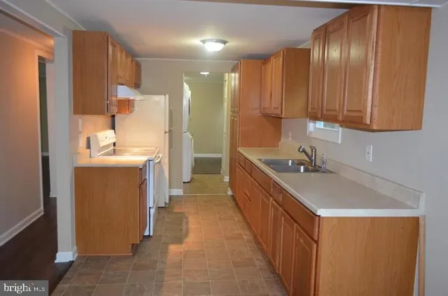 a bathroom with a toilet and a sink