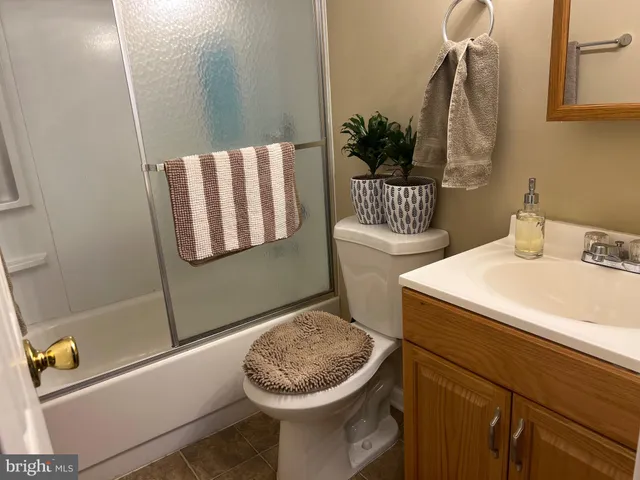 a vase of flowers sitting on a table