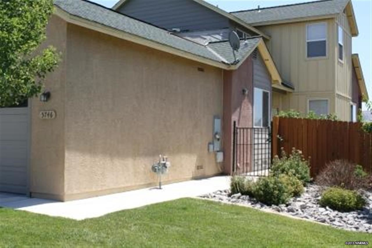 a house view with a garden space