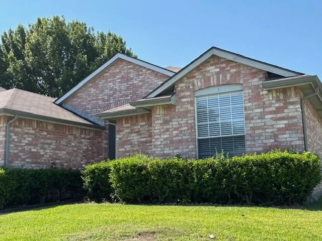 a view of a house with garden