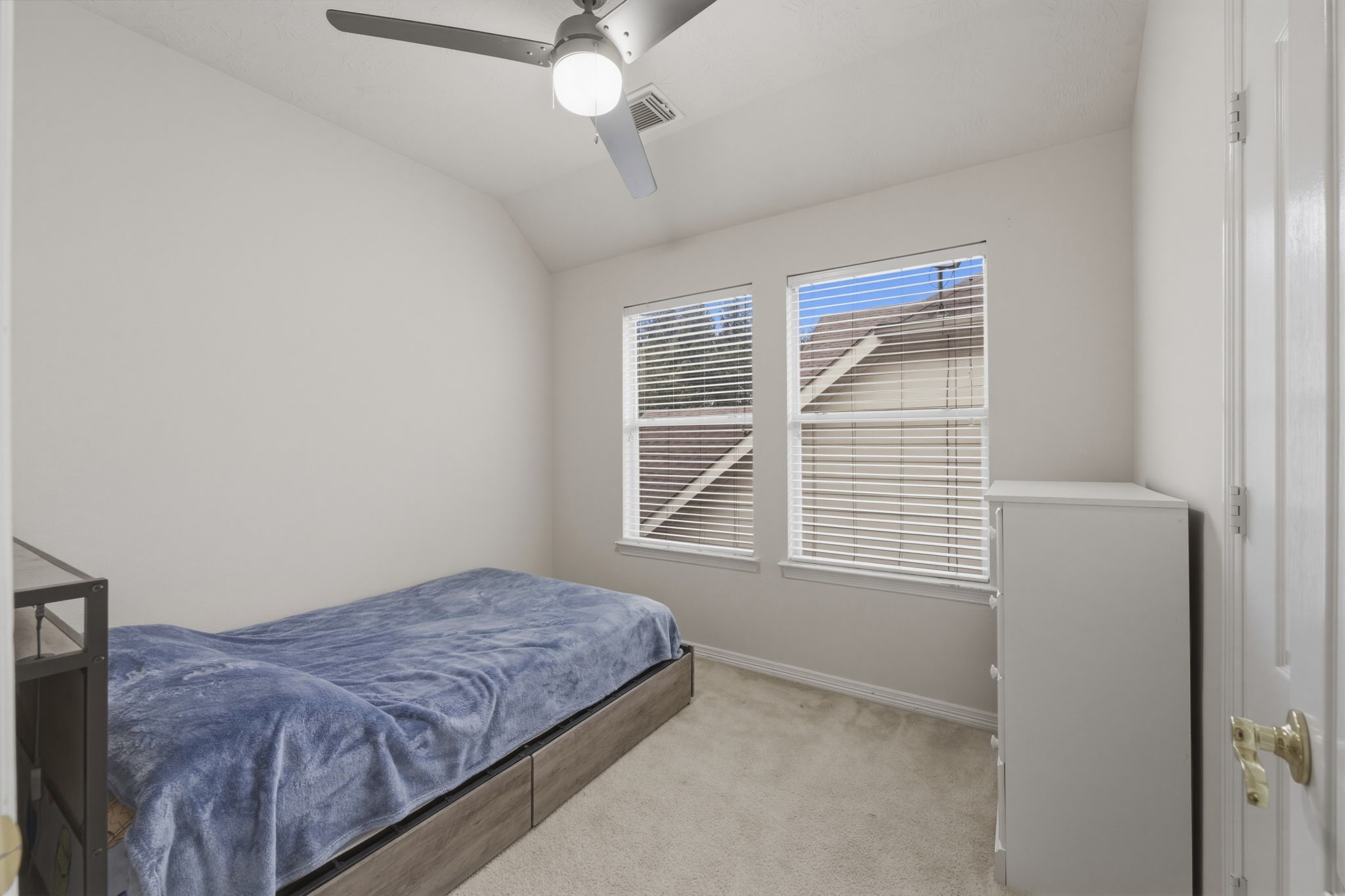 3006 Country Boy Court Spring, TX 77373 - Photo 13 of 17 a bedroom with a bed and a window