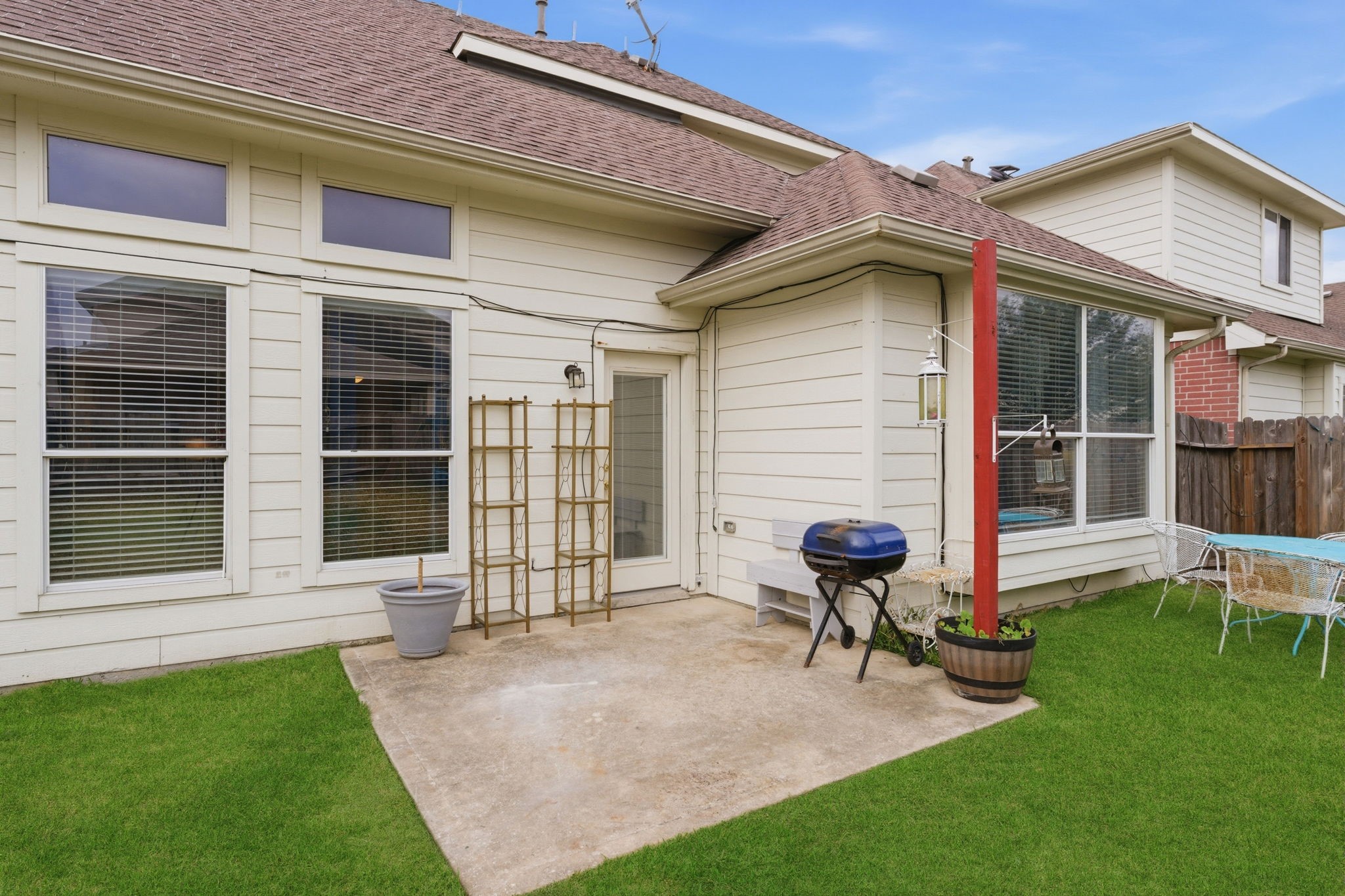 3006 Country Boy Court Spring, TX 77373 - Photo 16 of 17 a view of a house with backyard and a sitting area
