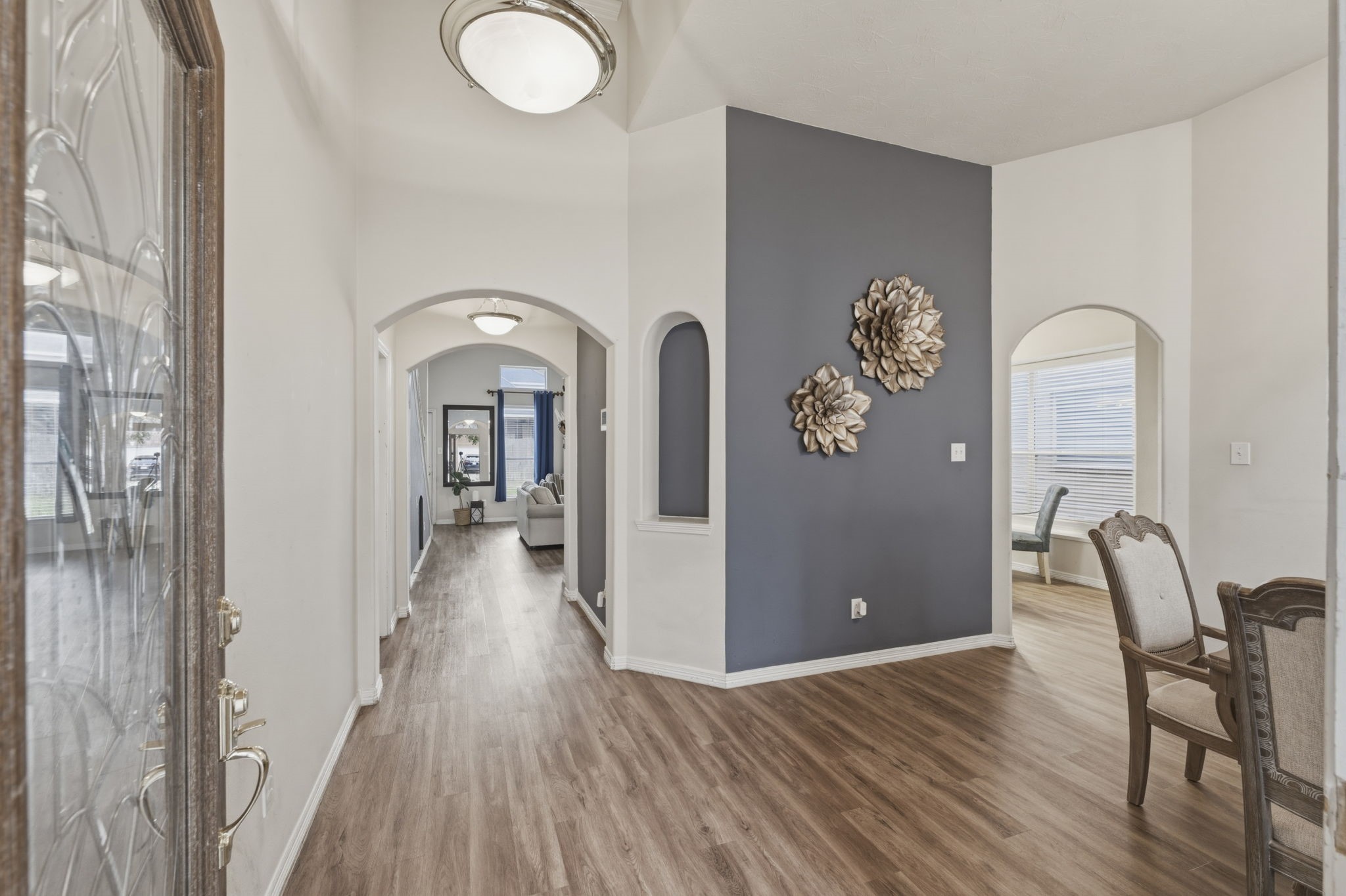 3006 Country Boy Court Spring, TX 77373 - Photo 2 of 17 a view of a livingroom with wooden floor and furniture
