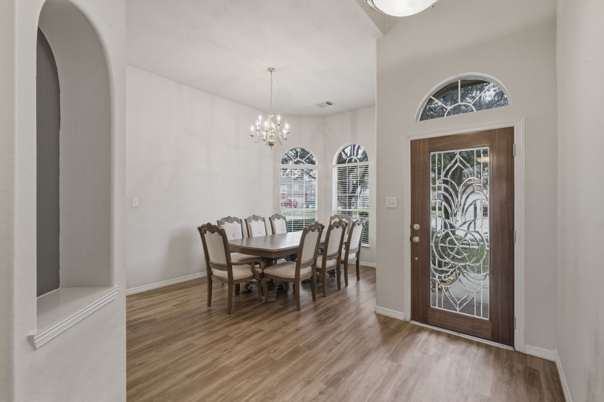 3006 Country Boy Court Spring, TX 77373 - Photo 6 of 17 a view of a dining room with furniture and wooden floor