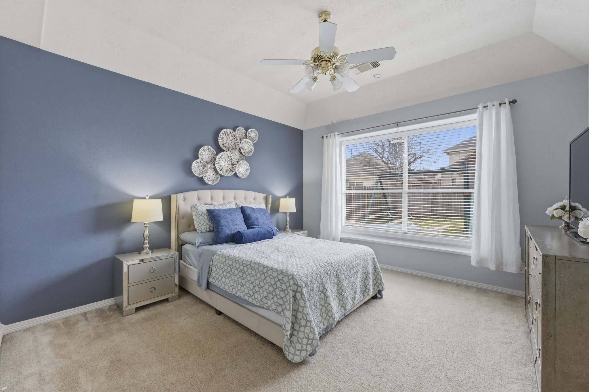 3006 Country Boy Court Spring, TX 77373 - Photo 8 of 17 a bedroom with a large bed and a window