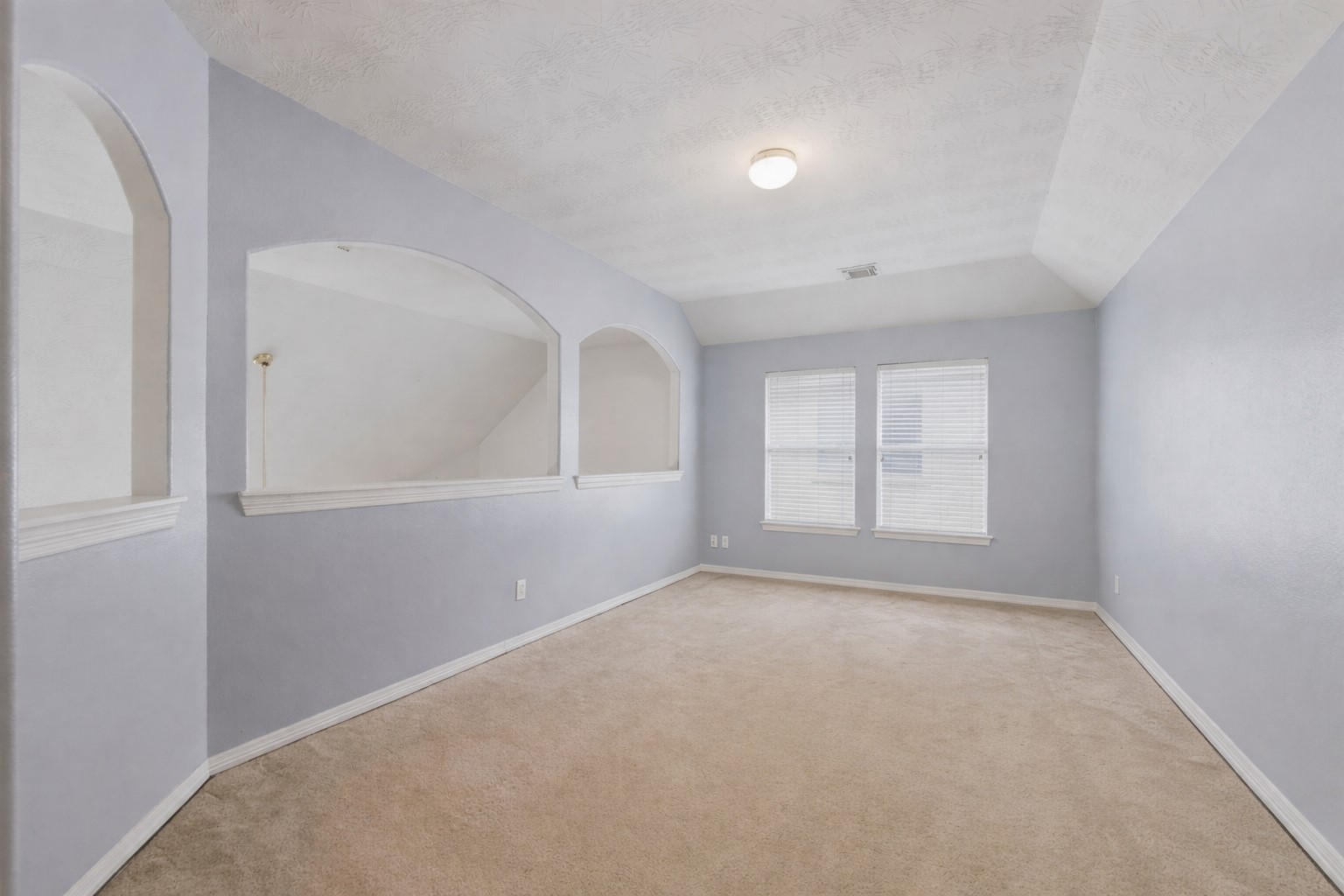 3006 Country Boy Court Spring, TX 77373 - Photo 10 of 17 an empty room with windows