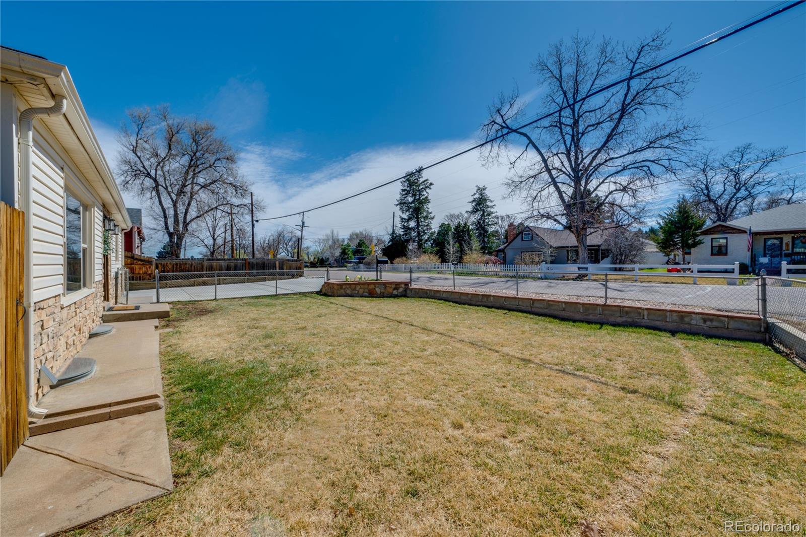 6811 West 48th Avenue Wheat Ridge, CO 80033 - Photo 28 of 33 a view of a swimming pool with an outdoor space