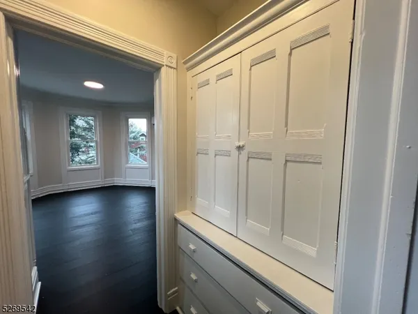 a view of a hallway with front door