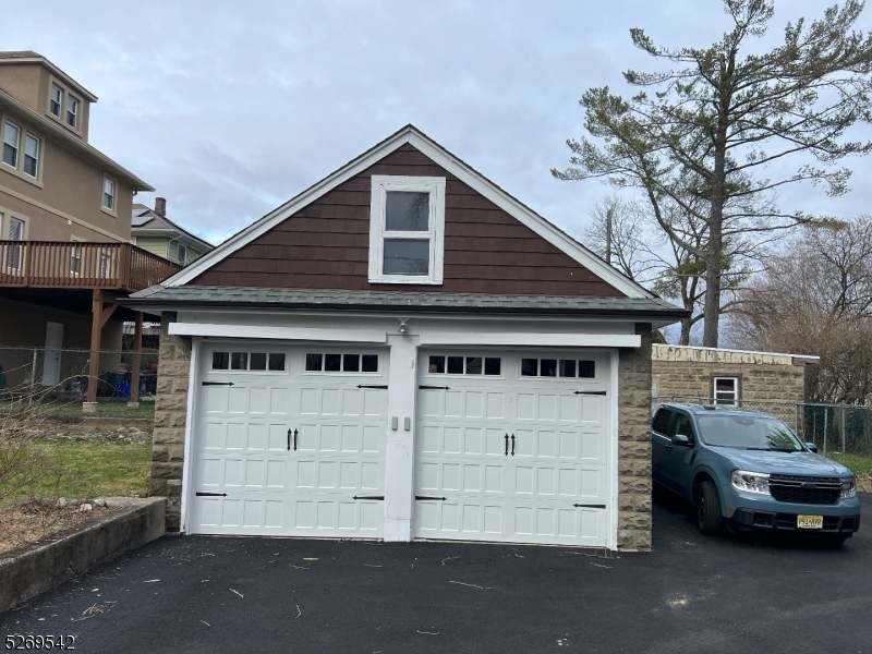 314 Cornelia Street, Unit 4 Boonton, NJ 07005 - Photo 32 of 32 a view of a house with a garage