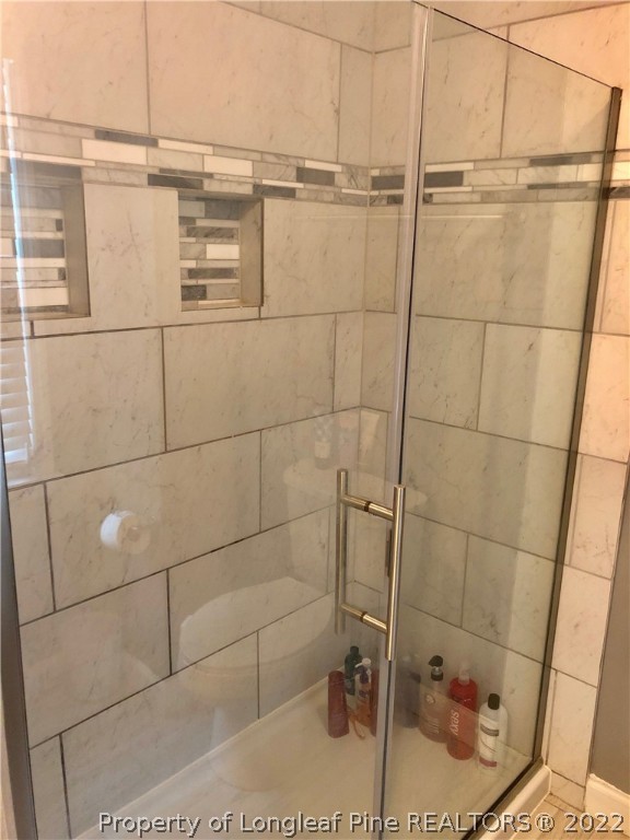 310 Old Farm Road Raeford, NC 28376 - Photo 27 of 29 a bathroom with a shower