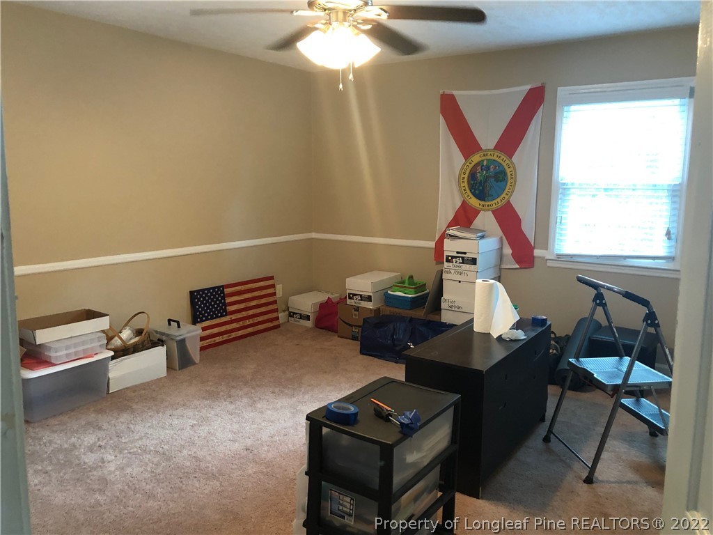 310 Old Farm Road Raeford, NC 28376 - Photo 29 of 29 a bedroom with furniture and a window