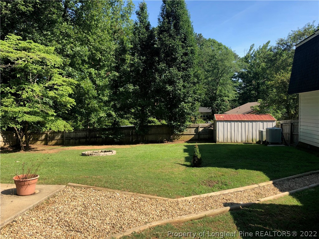 310 Old Farm Road Raeford, NC 28376 - Photo 8 of 29 a view of a house with a yard