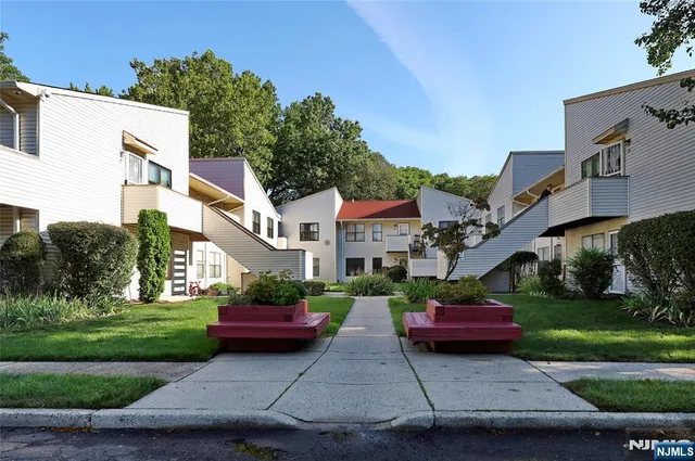 a house view with a garden space