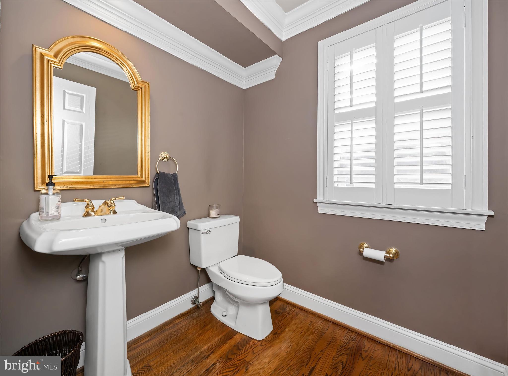 716 Regency Hill Road Hockessin, DE 19707 - Photo 31 of 73 Powder Room w/ Window & Crown Molding
