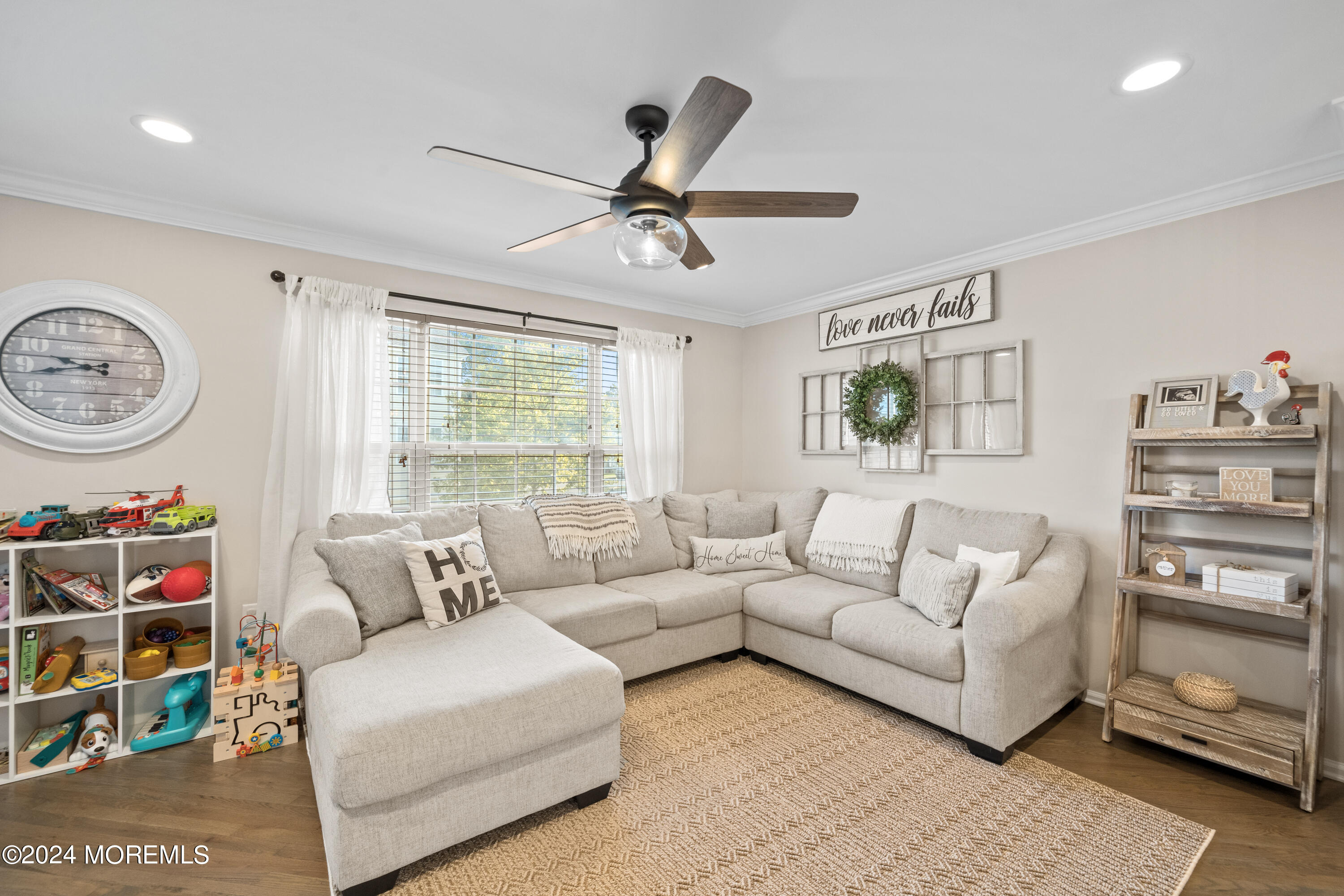 5 Kuczynski Drive, Unit 945 Parlin, NJ 08859 - Photo 19 of 62 a living room with furniture and a window