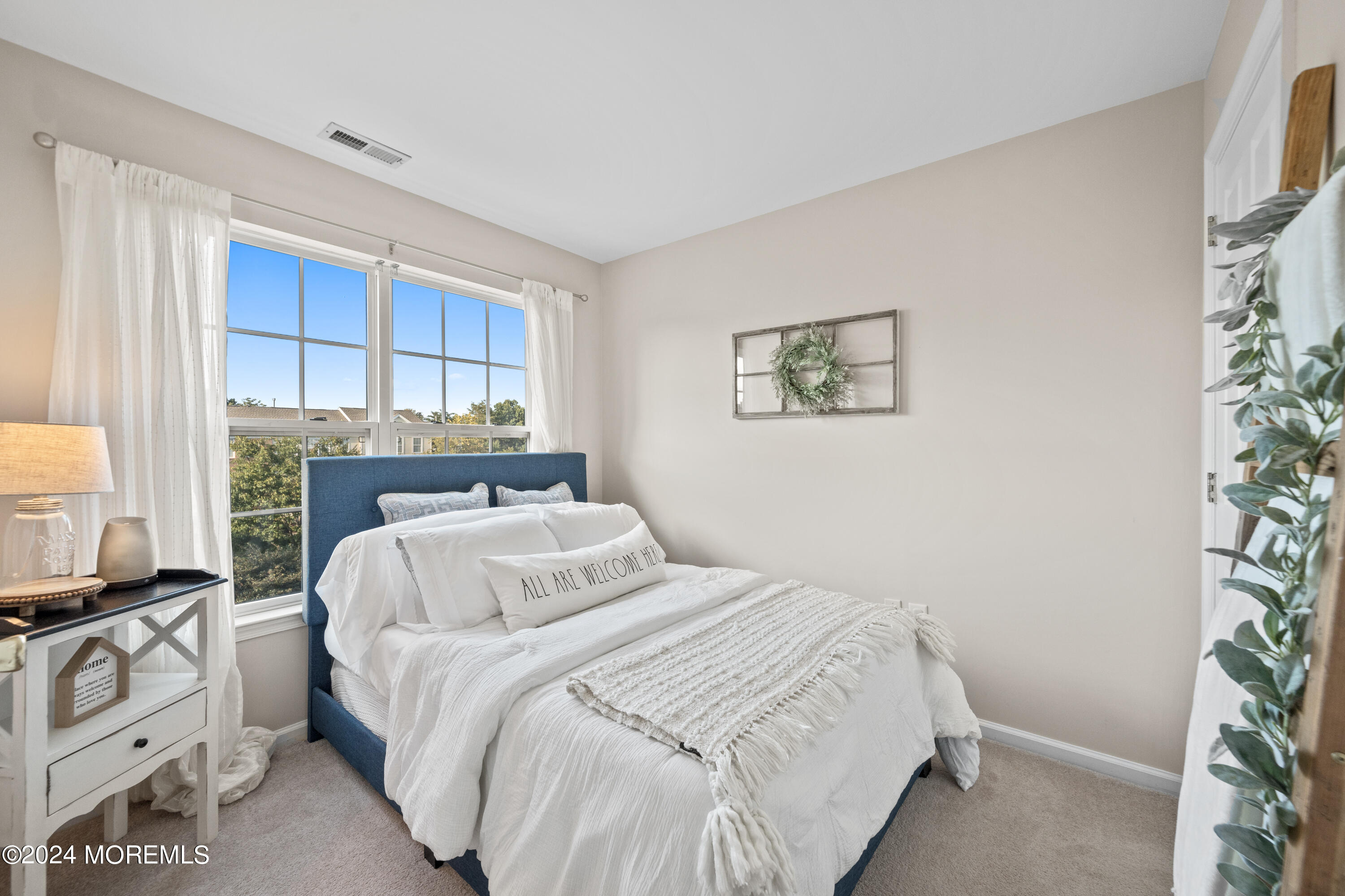 5 Kuczynski Drive, Unit 945 Parlin, NJ 08859 - Photo 25 of 62 a bedroom with a bed and a window