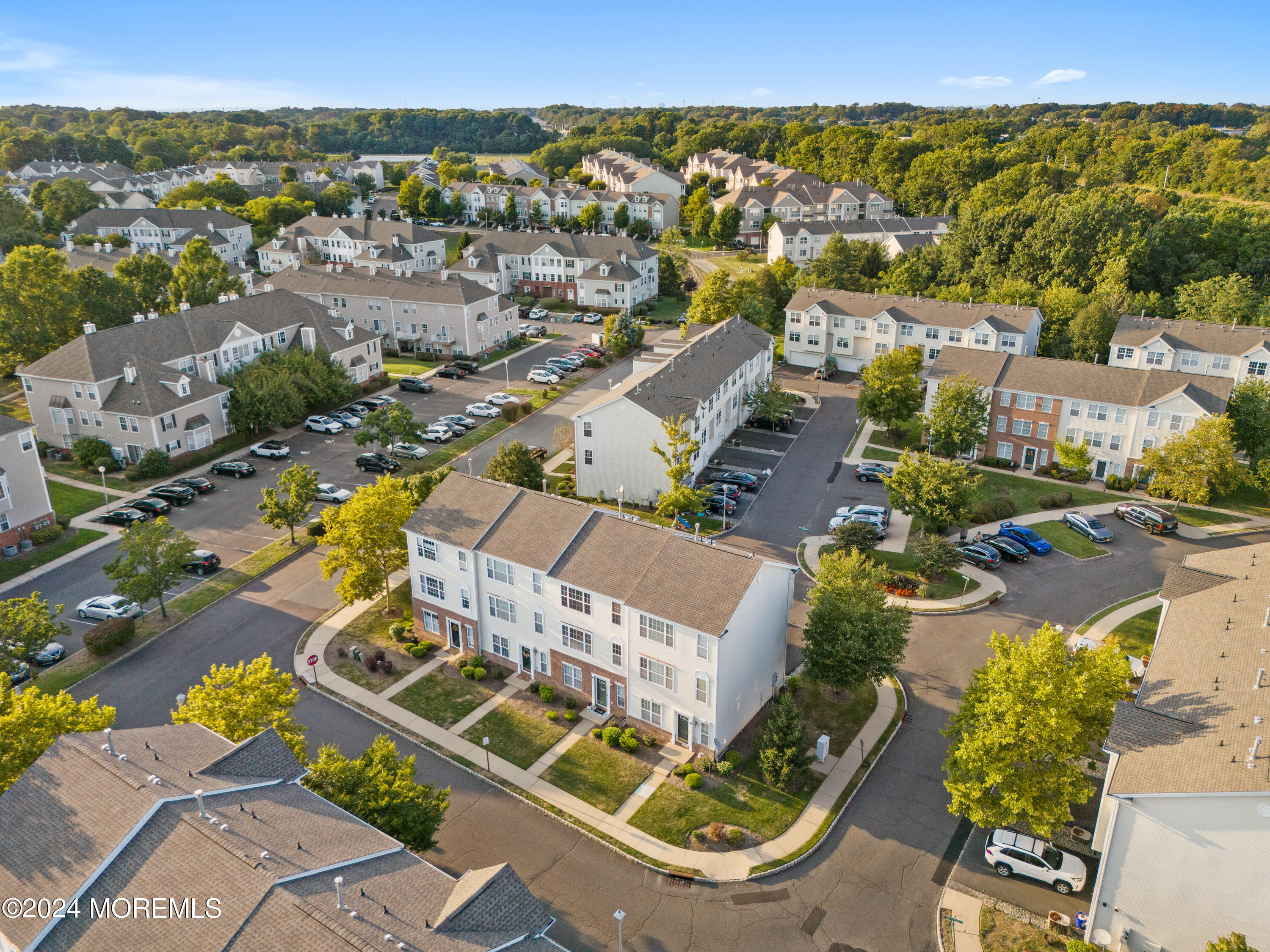 5 Kuczynski Drive, Unit 945 Parlin, NJ 08859 - Photo 43 of 62 an aerial view of residential houses with outdoor space