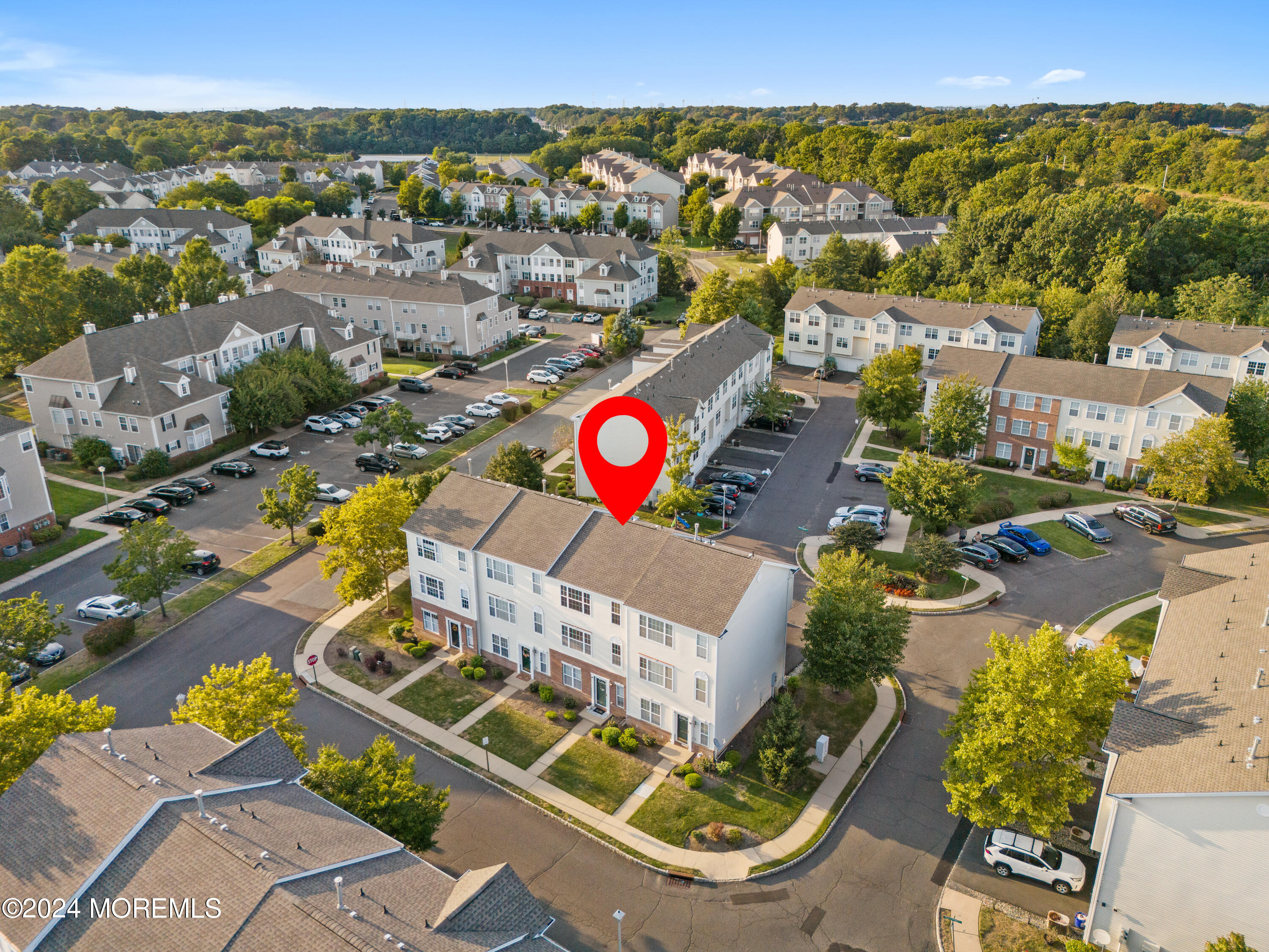 5 Kuczynski Drive, Unit 945 Parlin, NJ 08859 - Photo 44 of 62 an aerial view of residential houses with outdoor space