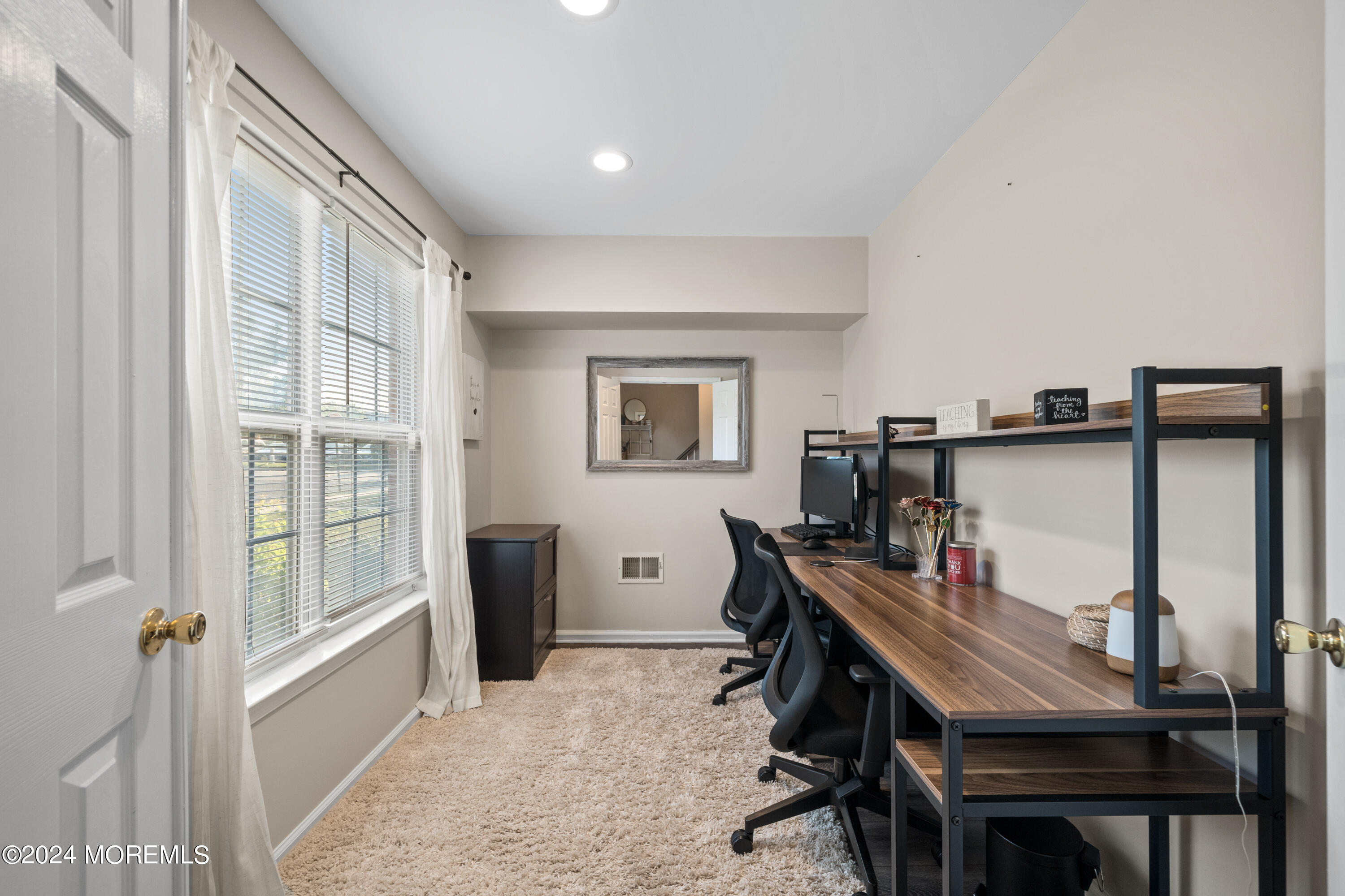 5 Kuczynski Drive, Unit 945 Parlin, NJ 08859 - Photo 5 of 62 a view of a livingroom with furniture and windows